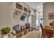 Inviting mudroom with built-in bench, storage baskets, coat hooks, and decorative wreath detail at 1737 24Th Ave. N, North Myrtle Beach, SC 29582