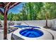 Backyard featuring a pool, a hot tub, an outdoor dining area, and a privacy fence at 1737 24Th Ave. N, North Myrtle Beach, SC 29582