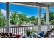 Inviting porch with comfortable seating and a scenic view of the neighborhood at 1737 24Th Ave. N, North Myrtle Beach, SC 29582