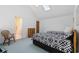 View of bedroom with two beds, sky lights, vaulted ceiling and view to the ensuite bathroom at 1890 Colony Dr. # 17L, Surfside Beach, SC 29575