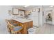 Efficient kitchen with a convenient breakfast bar, providing a comfortable and practical cooking space at 1890 Colony Dr. # 17L, Surfside Beach, SC 29575