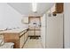 Well-lit kitchen area with breakfast bar, essential appliances, and a functional layout for meal preparation at 1890 Colony Dr. # 17L, Surfside Beach, SC 29575