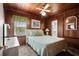 Relaxing bedroom with wood paneling and coastal decor at 2006 S Ocean Blvd., North Myrtle Beach, SC 29582