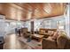 Inviting living room with hardwood floors, lots of seating, and a dining area at 2006 S Ocean Blvd., North Myrtle Beach, SC 29582