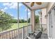 Screened-in balcony with furniture and scenic view of the field at 2180 Waterview Dr. # 1036, North Myrtle Beach, SC 29582