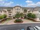 Beautiful condo complex with meticulous landscaping, lush greenery, and well-maintained parking area at 2180 Waterview Dr. # 1036, North Myrtle Beach, SC 29582