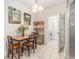 Cozy dining area featuring tile floors and convenient access to the laundry room at 2180 Waterview Dr. # 1036, North Myrtle Beach, SC 29582