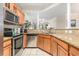 Modern kitchen featuring granite countertops and stainless steel appliances at 2180 Waterview Dr. # 1036, North Myrtle Beach, SC 29582