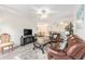 Inviting living room featuring wood floors, leather furniture, and stylish decor at 2180 Waterview Dr. # 1036, North Myrtle Beach, SC 29582