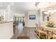 Open living space with hardwood floors, decorative columns, and plenty of natural light at 2180 Waterview Dr. # 1036, North Myrtle Beach, SC 29582
