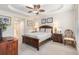Beautiful main bedroom with tray ceiling, neutral color palette, and ensuite bathroom access at 2180 Waterview Dr. # 1036, North Myrtle Beach, SC 29582