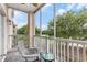 Relaxing screened-in patio with seating, offering scenic views of the lush green landscape and blue skies at 2180 Waterview Dr. # 1036, North Myrtle Beach, SC 29582