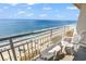 Enjoy the ocean view from the balcony while seated in comfortable outdoor chairs and table at 2301 S Ocean Blvd. # 1405, North Myrtle Beach, SC 29582