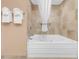Clean and well-maintained bathtub with a shower curtain and fresh towels nearby at 2301 S Ocean Blvd. # 1405, North Myrtle Beach, SC 29582