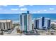 High-rise condo building with ocean views, offering a blend of modern design and beachside living at 2301 S Ocean Blvd. # 1405, North Myrtle Beach, SC 29582
