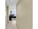 Bright hallway leading to a cozy living room with ocean views and comfortable seating at 2301 S Ocean Blvd. # 1405, North Myrtle Beach, SC 29582