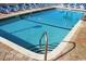 Refreshing swimming pool with brick trim and clear blue water at 2301 S Ocean Blvd. # 1405, North Myrtle Beach, SC 29582
