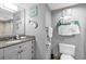 Clean bathroom featuring granite countertops, a modern vanity, and beach-themed decor enhancing the space with coastal charm at 2301 S Ocean Blvd. # 702, North Myrtle Beach, SC 29582