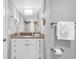 Bathroom vanity with granite countertops and decorative nautical themed decorations at 2301 S Ocean Blvd. # 702, North Myrtle Beach, SC 29582