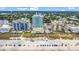 Oceanfront condo with easy beach access and a beautiful view of the beach with blue umbrellas at 2301 S Ocean Blvd. # 702, North Myrtle Beach, SC 29582
