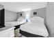 Bright bedroom featuring two comfortable queen beds with white linens and stylish furniture at 2301 S Ocean Blvd. # 702, North Myrtle Beach, SC 29582