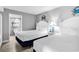Bright bedroom with two beds, crab art and an en-suite bathroom, creating a comfortable and themed retreat at 2301 S Ocean Blvd. # 702, North Myrtle Beach, SC 29582