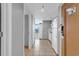 Hallway view featuring a kitchen, balcony access, and serene vistas of the coastline, enhancing the living experience at 2301 S Ocean Blvd. # 702, North Myrtle Beach, SC 29582
