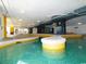 Indoor lazy river with colorful tile and relaxing atmosphere at 2301 S Ocean Blvd. # 702, North Myrtle Beach, SC 29582