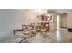 The dining room has elegant chandelier lighting and a seamless transition into the cozy kitchen at 2309 Withers Dr., Myrtle Beach, SC 29577