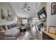Comfortable living room with vaulted ceiling, stylish sectional, and contemporary decor at 2461 Summerhaven Loop, Conway, SC 29527