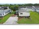 Aerial view of home features landscaping, a long driveway, and a well-manicured lawn at 259 Iroquis Trail, Longs, SC 29568