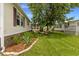 Inviting backyard with manicured landscaping and an outdoor seating area, perfect for relaxation and entertaining at 259 Iroquis Trail, Longs, SC 29568