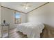 Bright bedroom with a comfortable bed and a view from the window at 259 Iroquis Trail, Longs, SC 29568