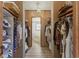 Walk-in closet space offering ample storage for clothes and accessories at 259 Iroquis Trail, Longs, SC 29568