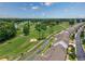 Scenic aerial view of a neighborhood adjacent to a lush golf course, offering serene living and recreational opportunities at 265 Connemara Dr. # D, Myrtle Beach, SC 29579