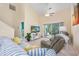 Bright and spacious living room with vaulted ceiling, sliding glass doors, and comfortable seating at 265 Connemara Dr. # D, Myrtle Beach, SC 29579