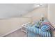 Cozy loft space with a striped sofa and a glass-top coffee table at 265 Connemara Dr. # D, Myrtle Beach, SC 29579