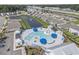 Aerial view of the community pool, pond and manicured landscaping in a well-maintained neighborhood at 2989 Skylar Dr., Myrtle Beach, SC 29577