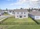 Backyard with a black metal fence surrounds the green lawn, a view from above at 2989 Skylar Dr., Myrtle Beach, SC 29577