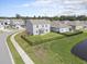 Large backyard with a black metal fence and a grassy lawn, an aerial perspective at 2989 Skylar Dr., Myrtle Beach, SC 29577