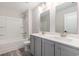 Full bathroom featuring gray vanity with double sinks and shower-tub combination at 2989 Skylar Dr., Myrtle Beach, SC 29577