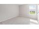 Bedroom with neutral walls and carpet with natural light from a window at 2989 Skylar Dr., Myrtle Beach, SC 29577