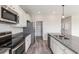Modern kitchen featuring white cabinets, stainless steel appliances, and granite countertops at 2989 Skylar Dr., Myrtle Beach, SC 29577
