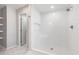 Bright, newly tiled walk-in shower with white subway tile and rain shower head at 2989 Skylar Dr., Myrtle Beach, SC 29577