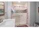Modern bathroom featuring a glass shower door, tiled walls, and stylish fixtures at 302 Sunnehanna Dr., Myrtle Beach, SC 29588