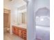 Bright bathroom featuring dual sinks and a shower with tub combination at 302 Sunnehanna Dr., Myrtle Beach, SC 29588