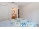 Bedroom featuring an attached ensuite bathroom, walk in closet, and neutral walls at 302 Sunnehanna Dr., Myrtle Beach, SC 29588