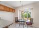 Cozy breakfast nook with bright natural light and a charming table setup at 302 Sunnehanna Dr., Myrtle Beach, SC 29588