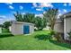 Spacious backyard featuring a shed, providing ample storage and outdoor opportunities at 303 Ayrie Ct., Conway, SC 29527