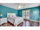 Bright bedroom features a ceiling fan and access to the outside at 303 Ayrie Ct., Conway, SC 29527